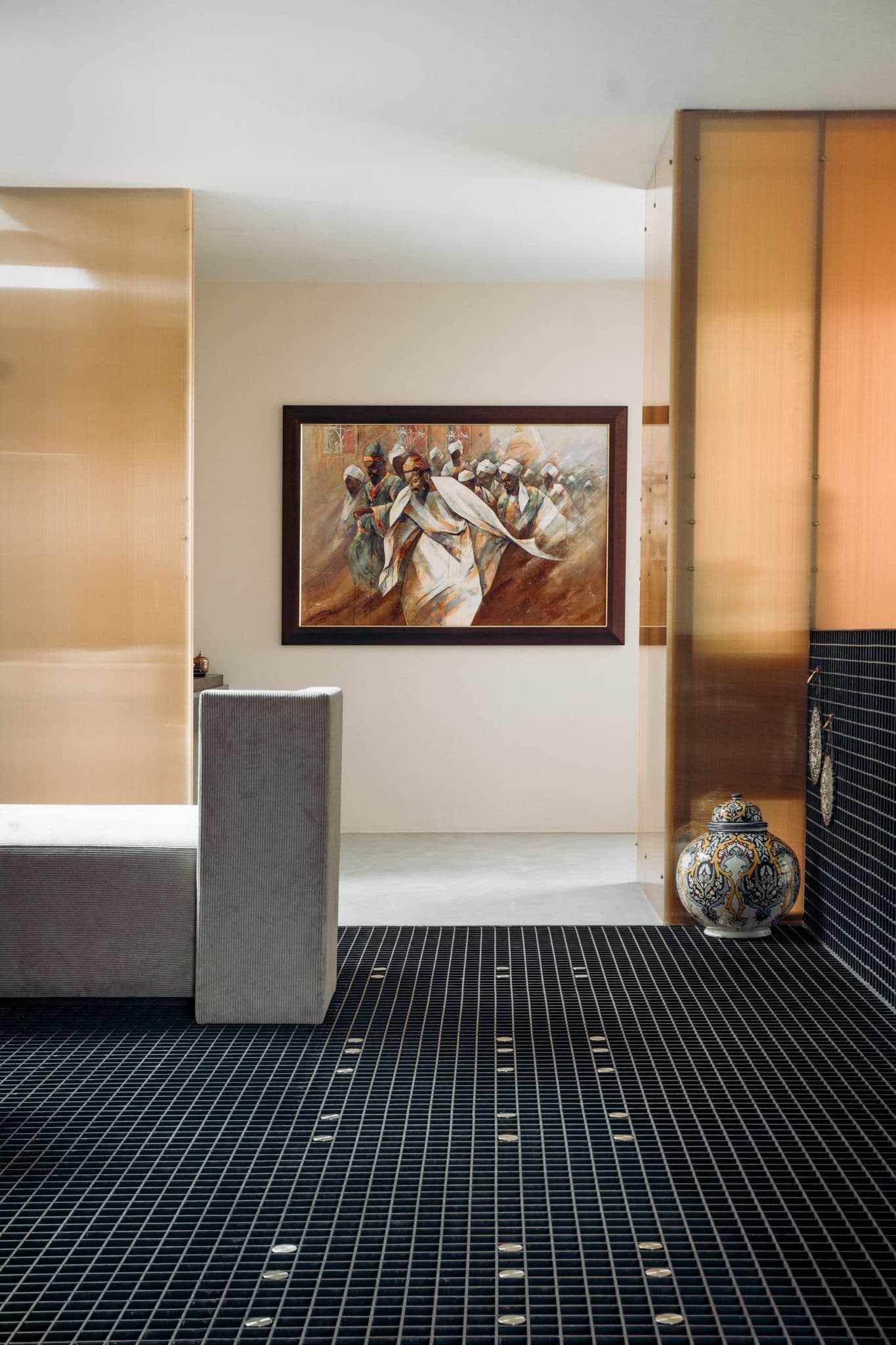 Hira premium residence lounge with warm amber accents