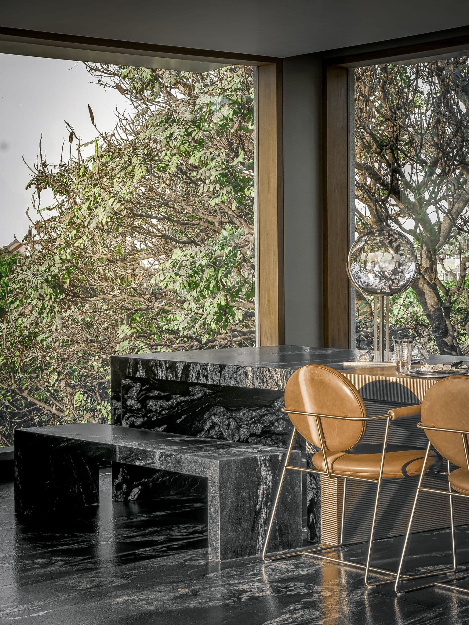 Hira exterior with layered concrete volumes